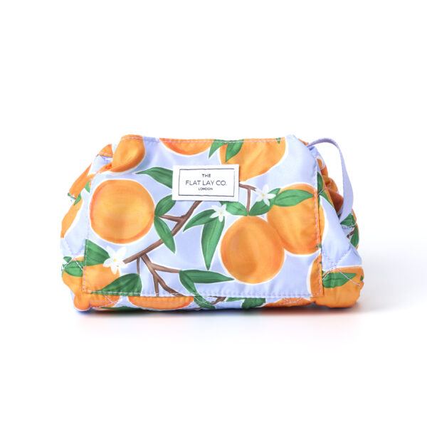 Flat Lay Co Mediterranean orange make up travel bag front profile white background