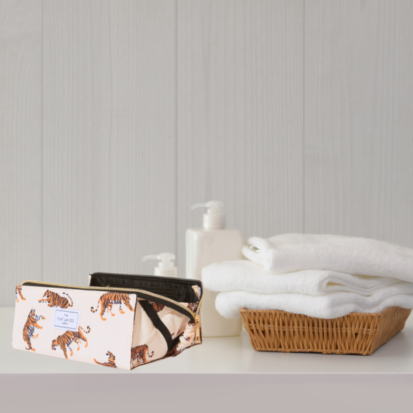 Flat Lay Tigers Make Up Toiletries Bag bathroom setting open