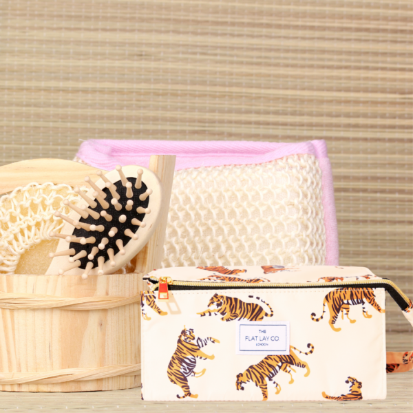 Flat Lay Tigers Make Up Toiletries Bag bathroom setting closed